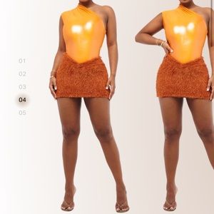 Orange asymmetrical bodysuit.